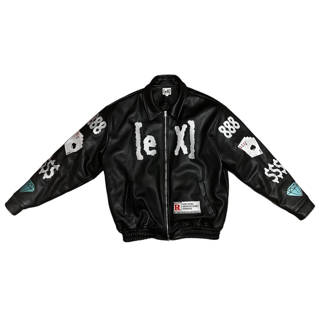 Black faux leather jacket featuring bold embroidered graphics, including '[eXI]' on the front, dice, dollar signs, diamonds, and '888' on the sleeves, with a unique streetwear aesthetic